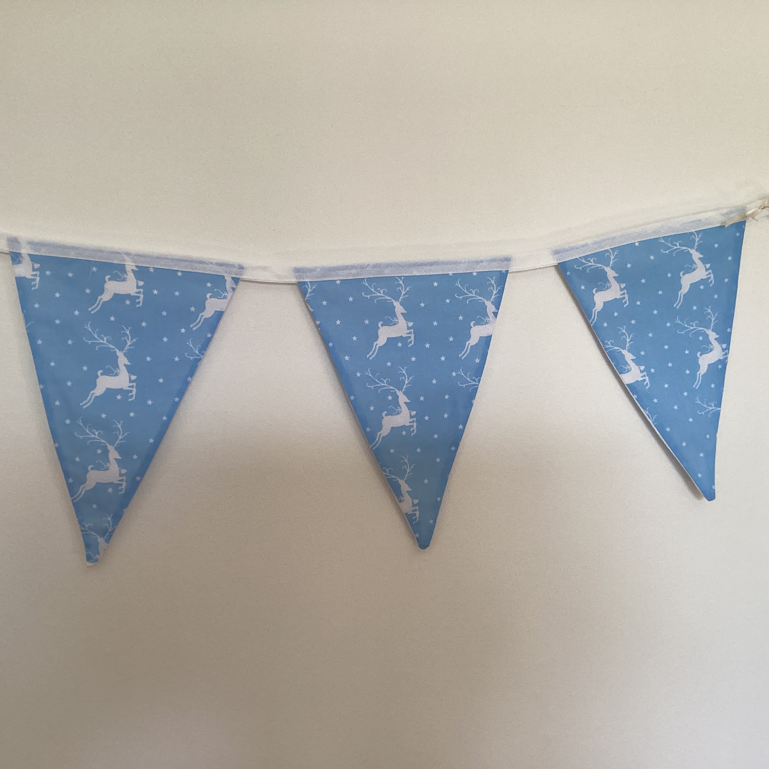 Christmas Bunting - white deer on pale blue