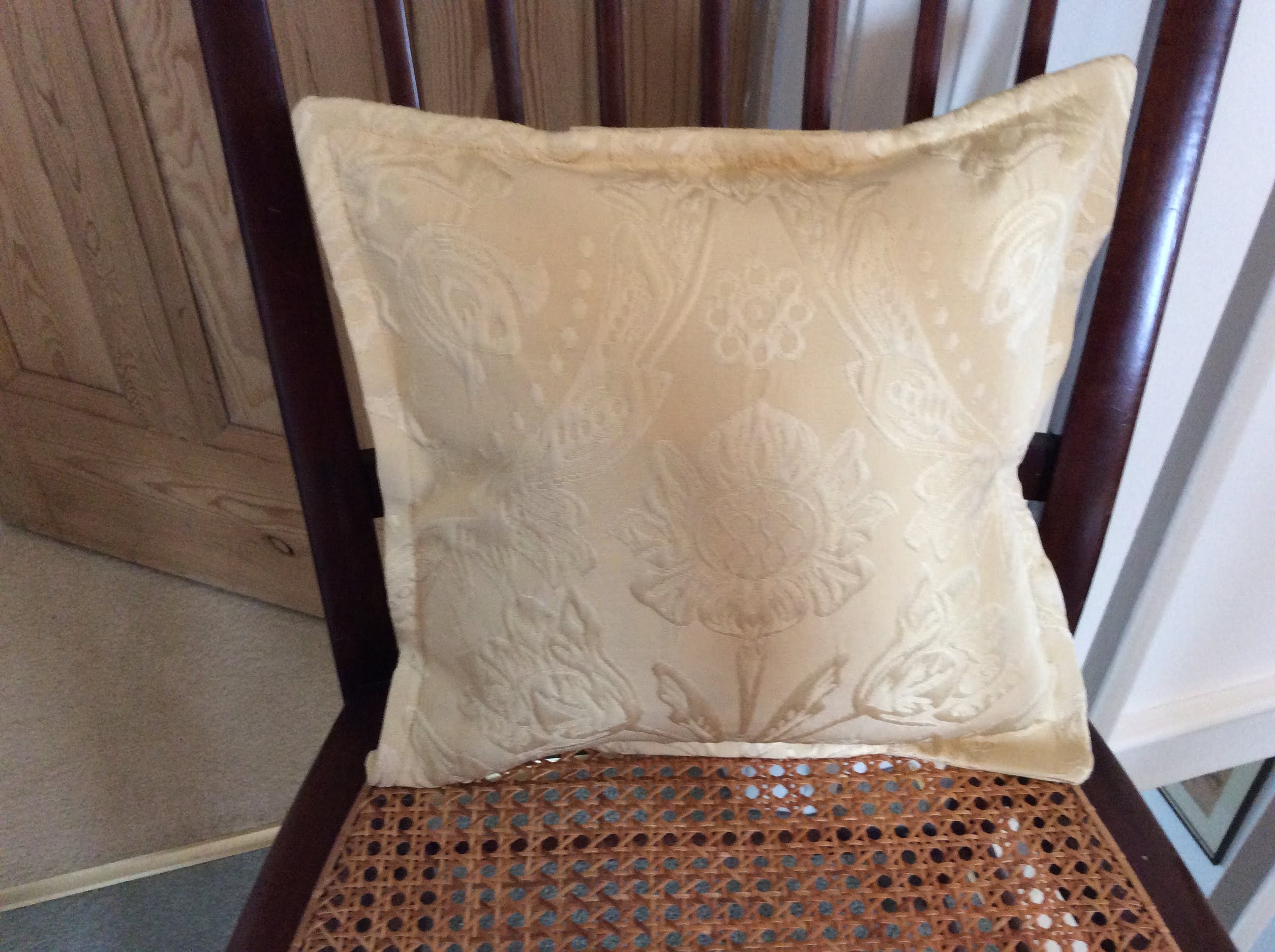 Cushion - gold brocade